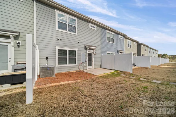a house view with a backyard space