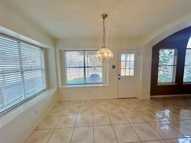 a view of a room with windows