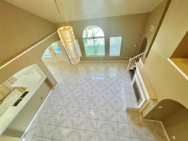 an empty room with a empty space and window