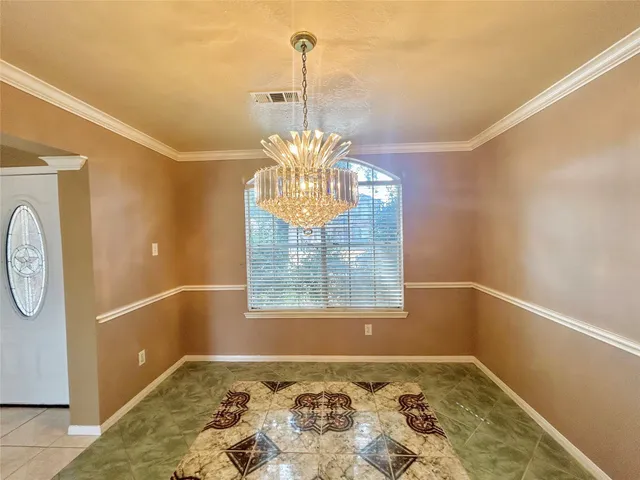 a view of a storage & utility room with a window