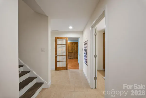 a view of entryway with stairs