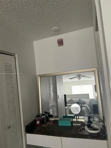 a view of living room with wooden floor