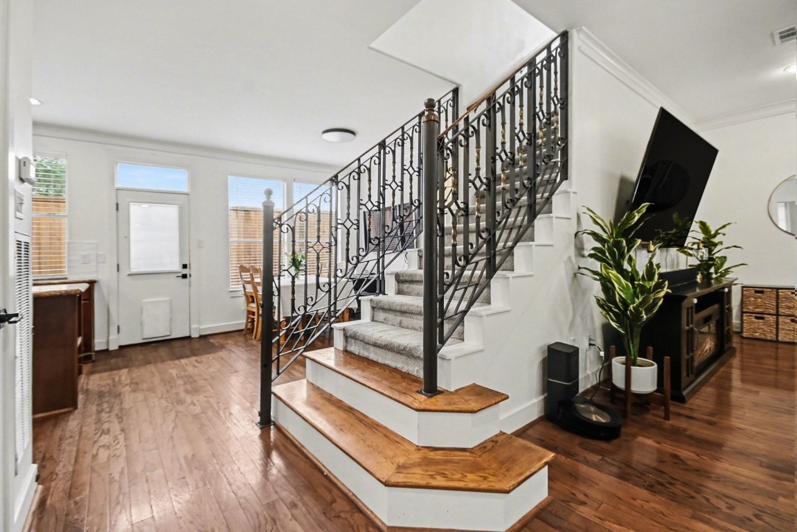 1470 Springrock Lane, Unit 6 Houston, TX 77055 - Photo 12 of 32 a view of entryway and hall with wooden floor