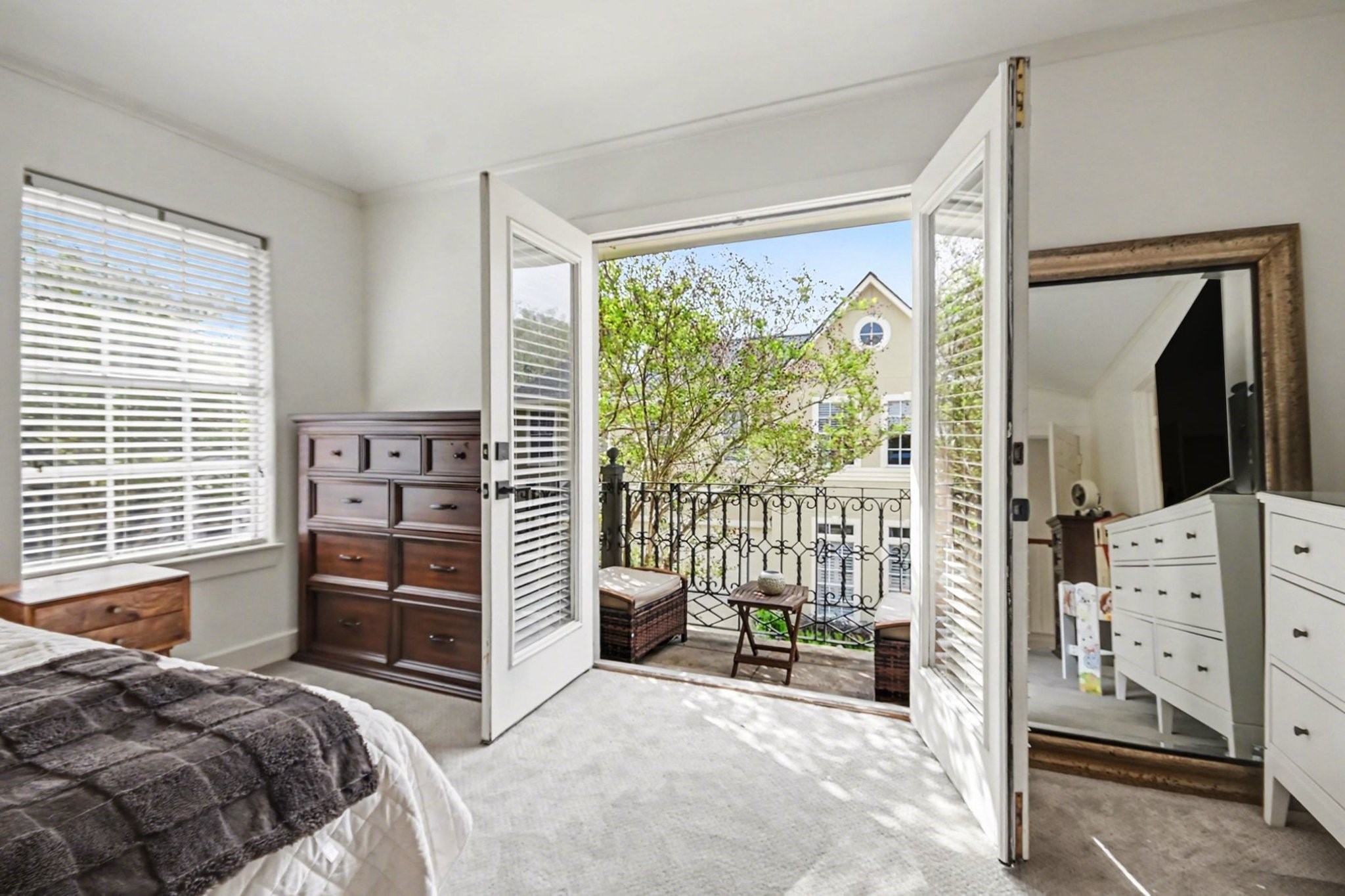 1470 Springrock Lane, Unit 6 Houston, TX 77055 - Photo 15 of 32 Private balcony off the primary suite with elegant French doors.