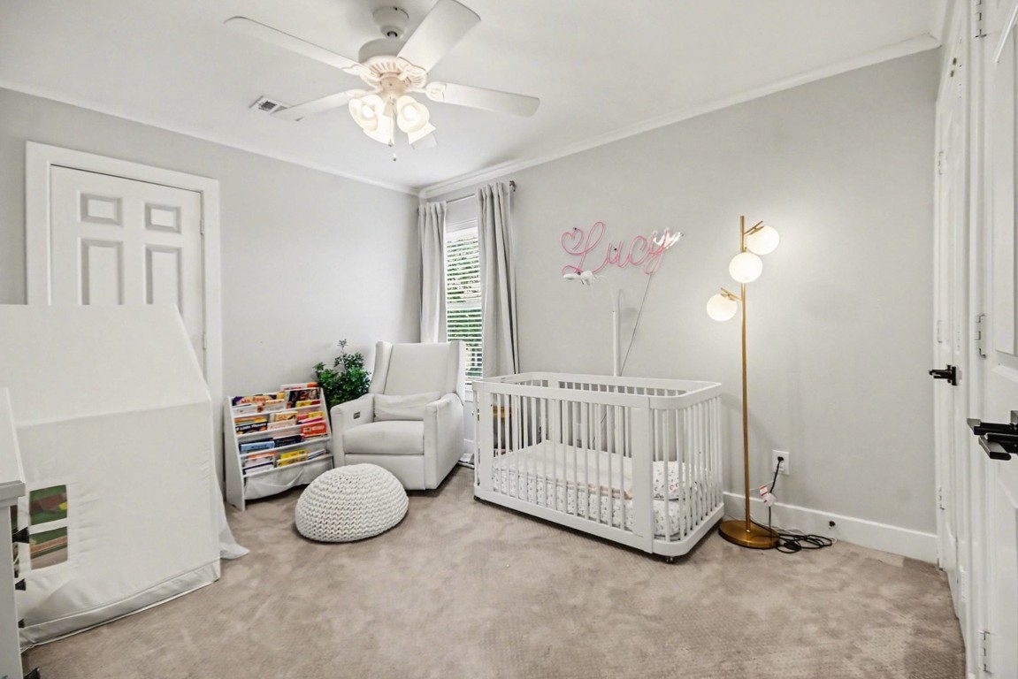 1470 Springrock Lane, Unit 6 Houston, TX 77055 - Photo 20 of 32 a bedroom with furniture and a window