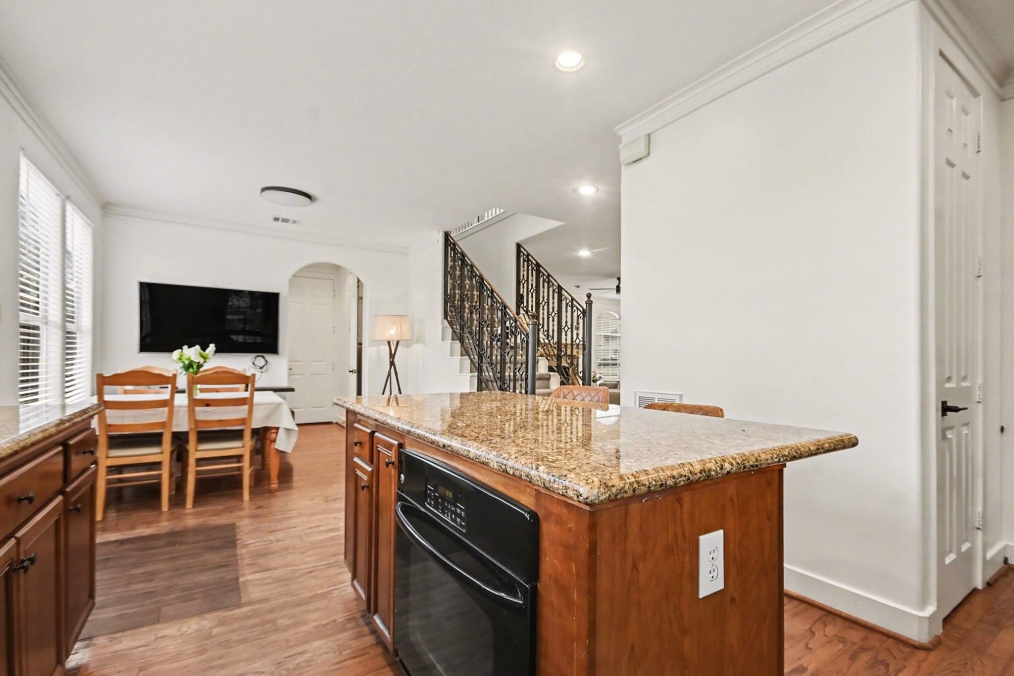 1470 Springrock Lane, Unit 6 Houston, TX 77055 - Photo 8 of 32 The spacious island and long countertops offer plenty of room for both everyday living and entertaining.