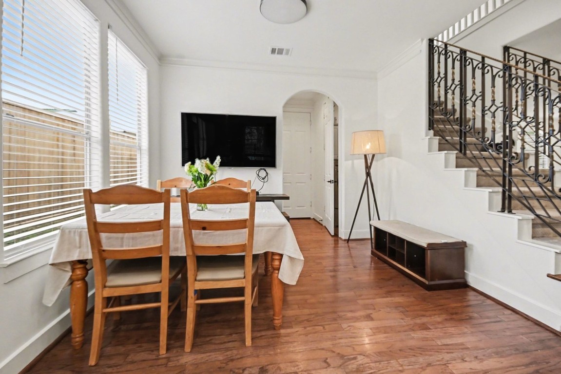 1470 Springrock Lane, Unit 6 Houston, TX 77055 - Photo 10 of 32 a view of a dining room with furniture and window