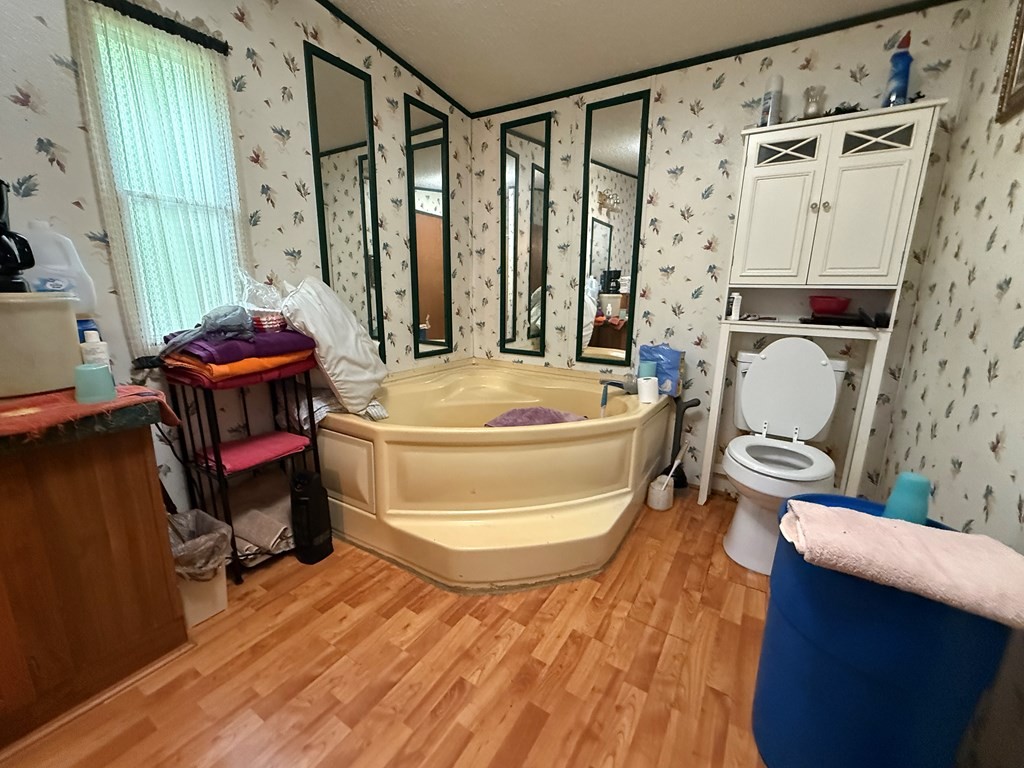 920 Pioneer Road Grimsley, TN 38565 - Photo 7 of 15 a bathroom with a toilet and a shower