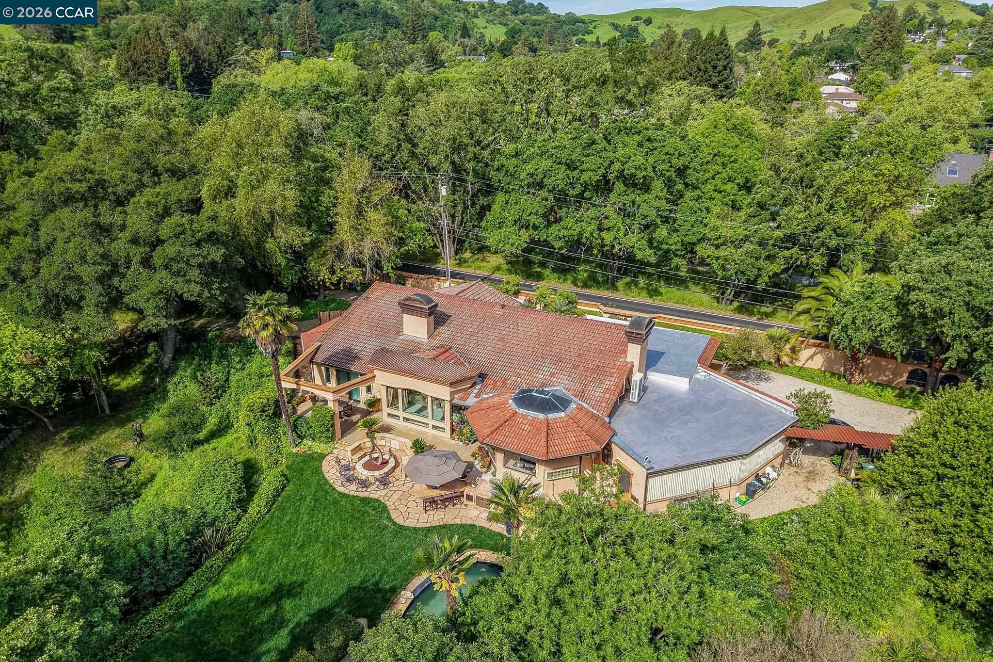 490 St Marys Road Lafayette, CA 94549 - Photo 47 of 61 an aerial view of a house with yard swimming pool and outdoor seating
