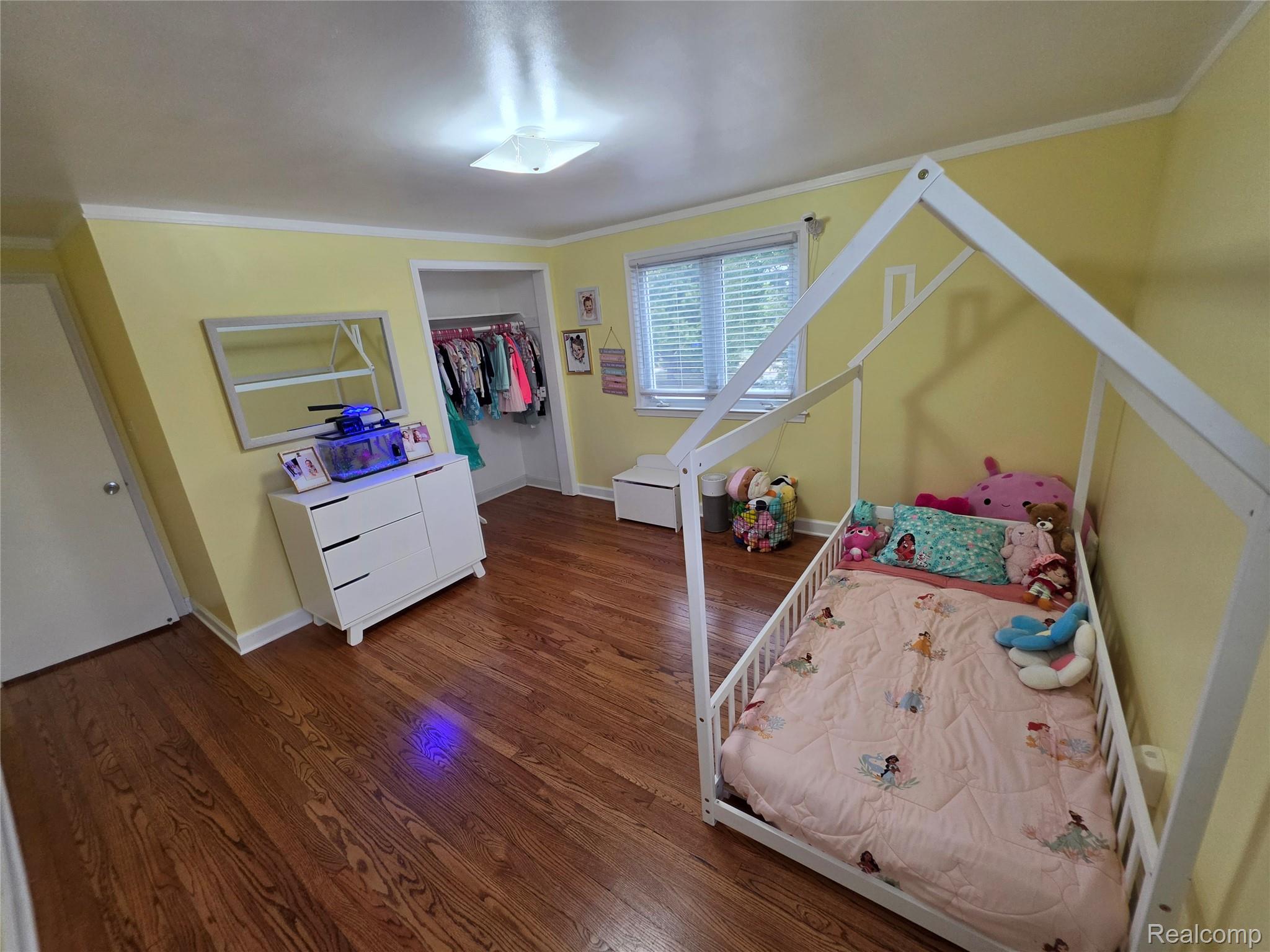 31159 Kelly Road Fraser, MI 48026 - Photo 16 of 34 Hardwood flooring, recessed lighting, double-paned window, and a built-in closet