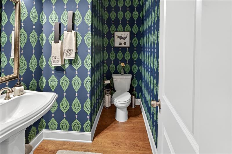 1956 Skyfall Circle Atlanta, GA 30319 - Photo 11 of 49 a bathroom with a sink a toilet and shower curtain