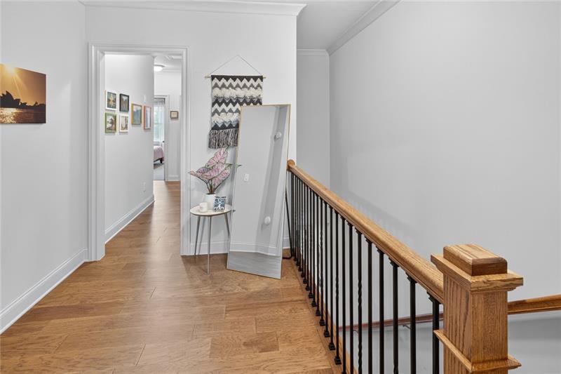 1956 Skyfall Circle Atlanta, GA 30319 - Photo 12 of 49 a view of a hallway with wooden floor and entryway