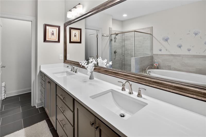 1956 Skyfall Circle Atlanta, GA 30319 - Photo 19 of 49 a bathroom with a sink and a mirror