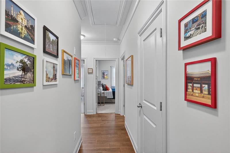 1956 Skyfall Circle Atlanta, GA 30319 - Photo 22 of 49 a view of a hallway with paintings on the wall