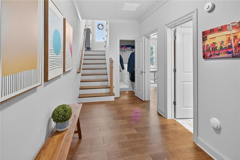 1956 Skyfall Circle Atlanta, GA 30319 - Photo 33 of 49 a view of entryway with wooden floor and stairs