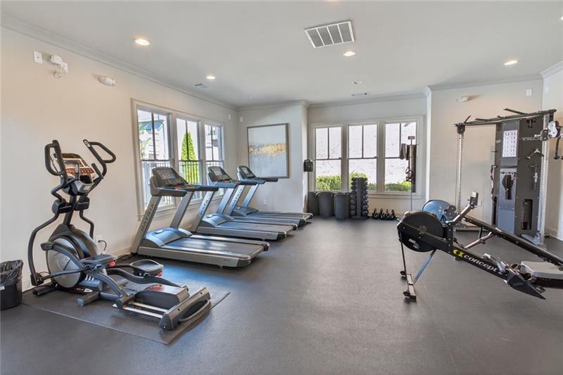 1956 Skyfall Circle Atlanta, GA 30319 - Photo 42 of 49 a view of a room with gym equipment