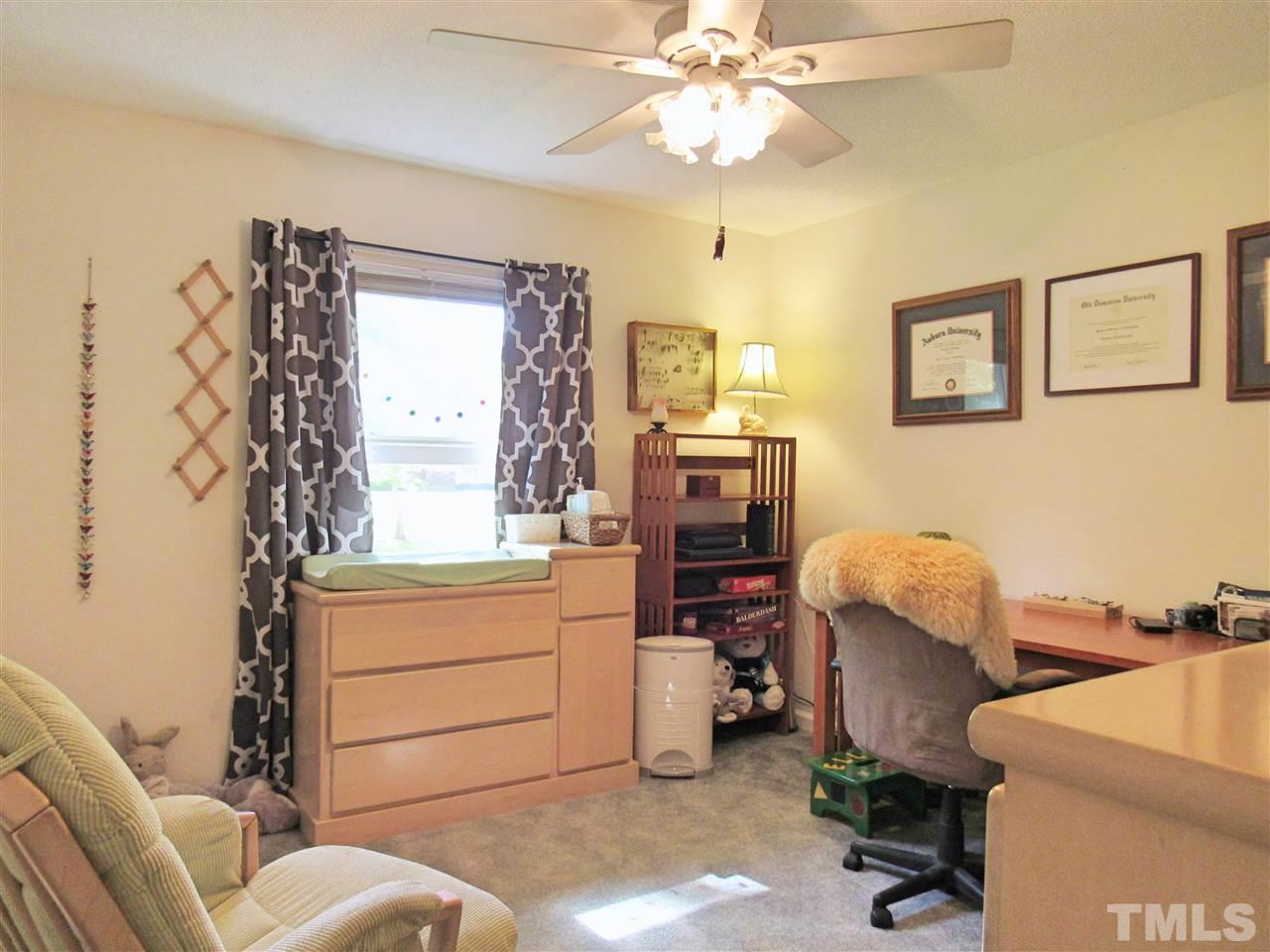 7204 Jock Road Bahama, NC 27503 - Photo 14 of 25 a living room with furniture and a window