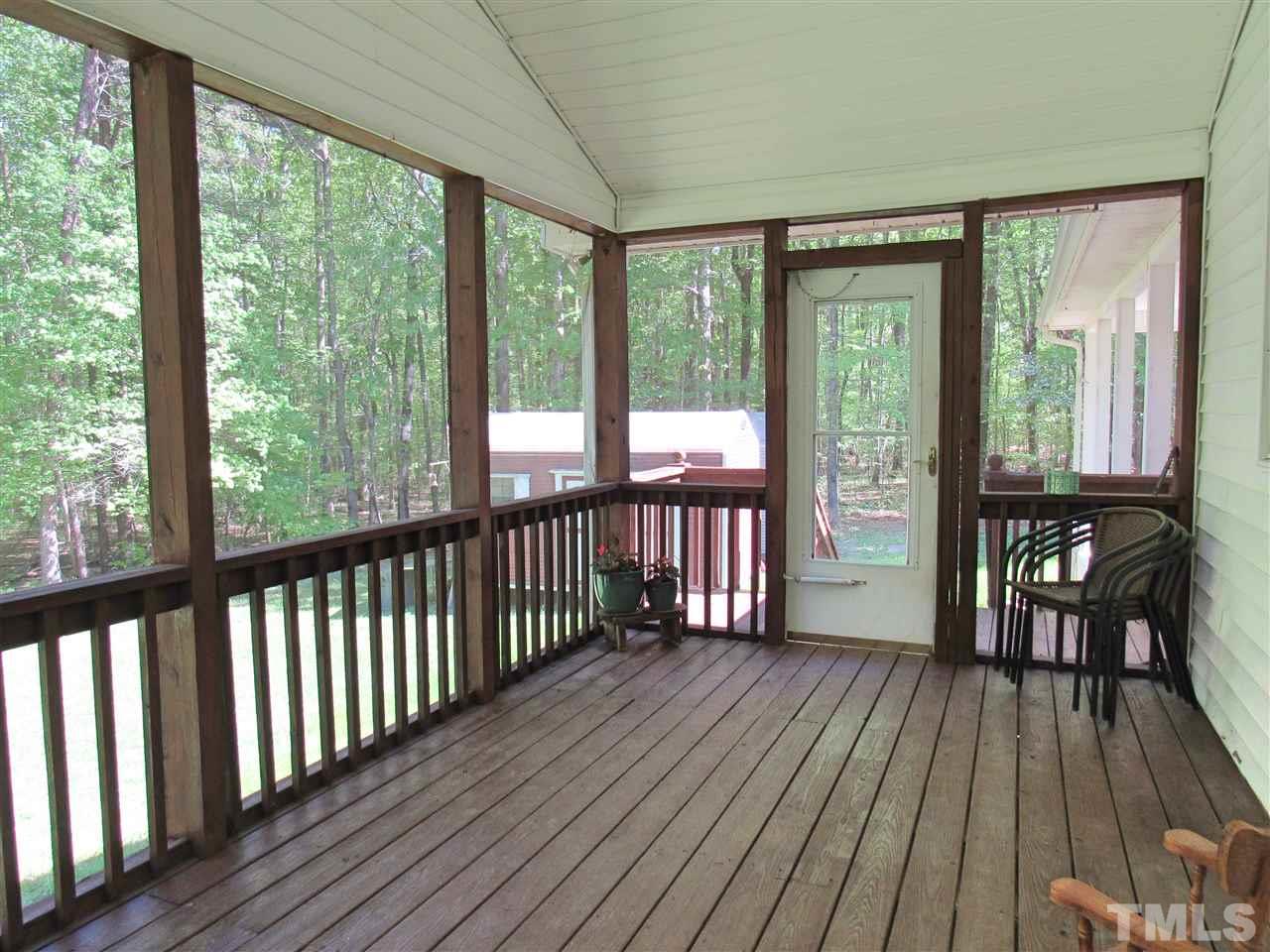 7204 Jock Road Bahama, NC 27503 - Photo 19 of 25 a view of a room with wooden floor and furniture