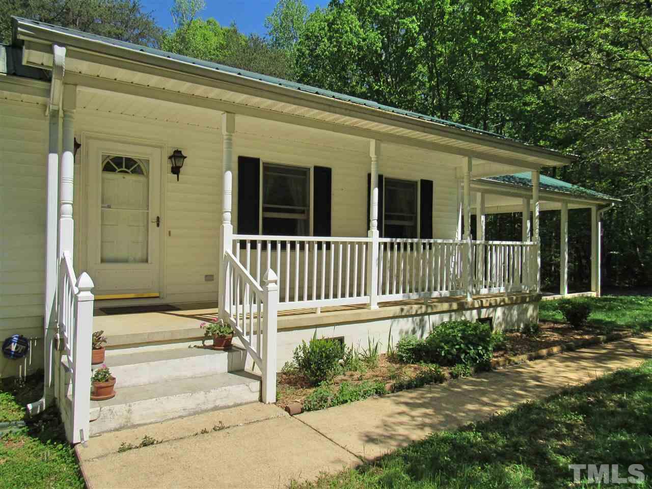 7204 Jock Road Bahama, NC 27503 - Photo 3 of 25 front view of a house with a small yard