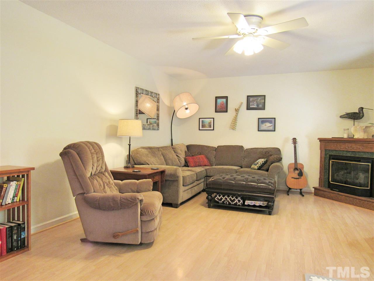 7204 Jock Road Bahama, NC 27503 - Photo 6 of 25 a living room with furniture and fireplace