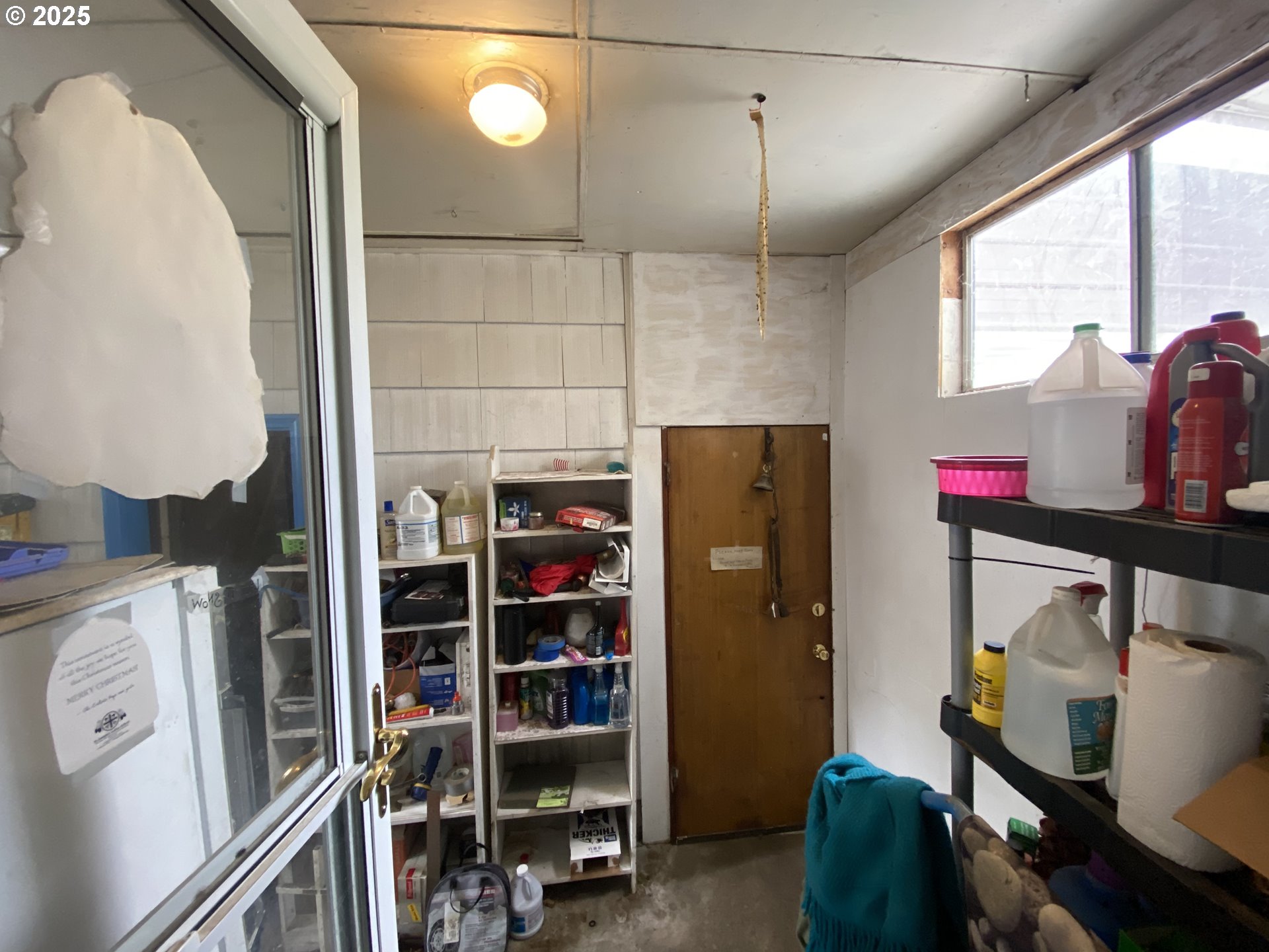 35001 Seavey Loop Road Eugene, OR 97405 - Photo 11 of 16 a view of walk in closet with clothes and shoes