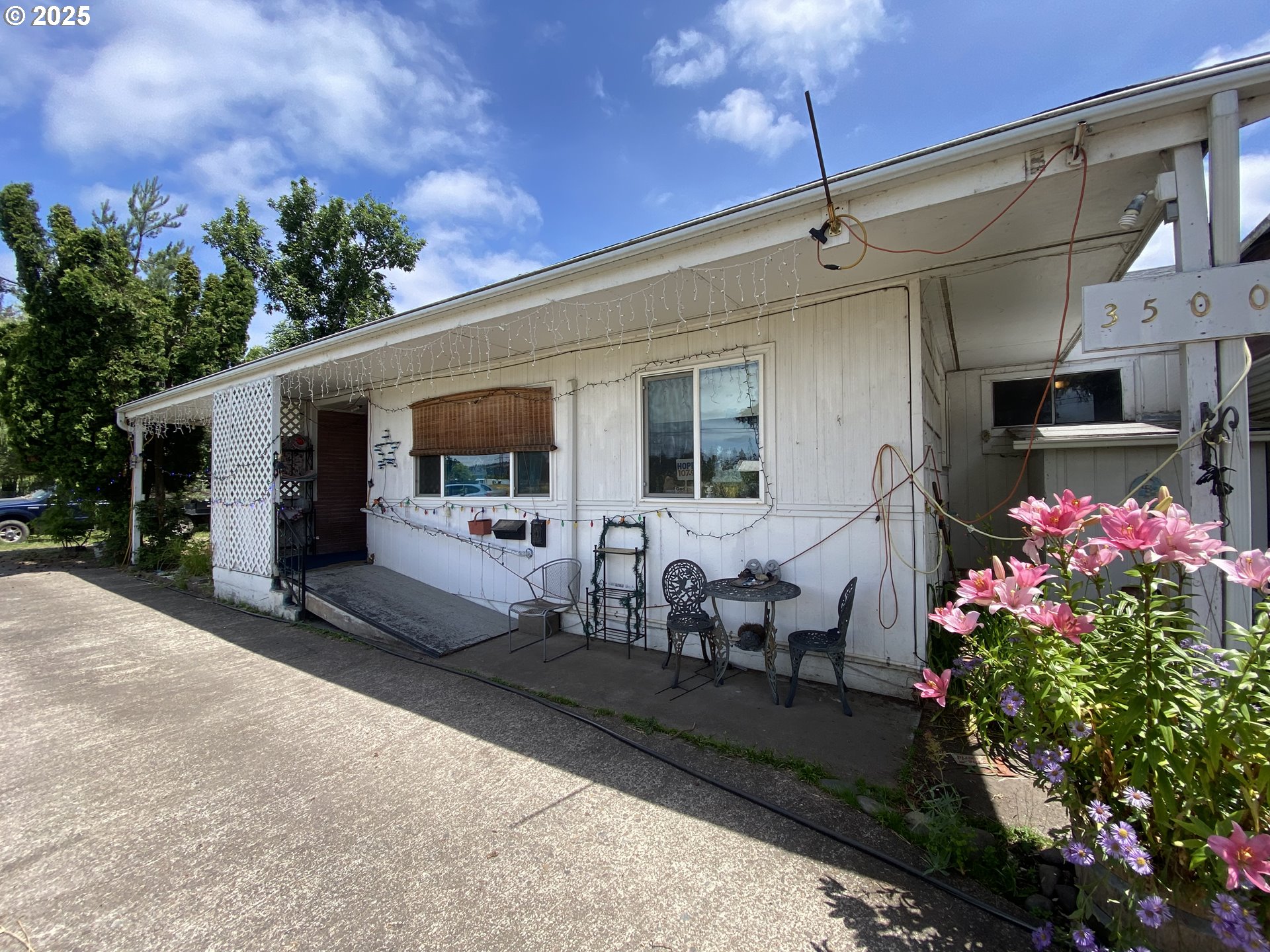 35001 Seavey Loop Road Eugene, OR 97405 - Photo 3 of 16 a front view of a house with patio