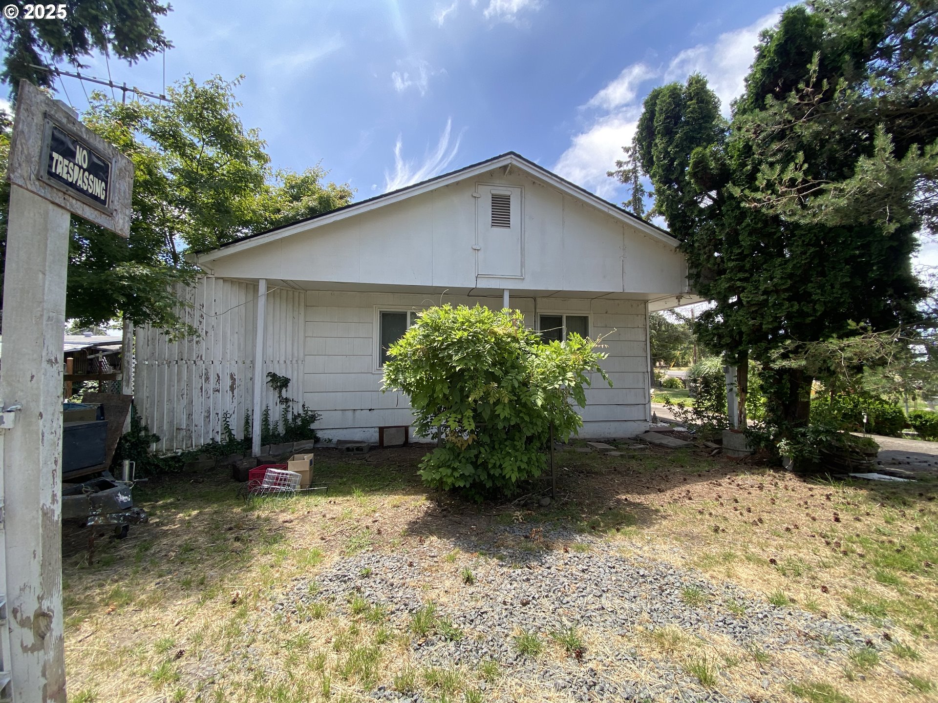 35001 Seavey Loop Road Eugene, OR 97405 - Photo 4 of 16 a view of a house with a yard and plants
