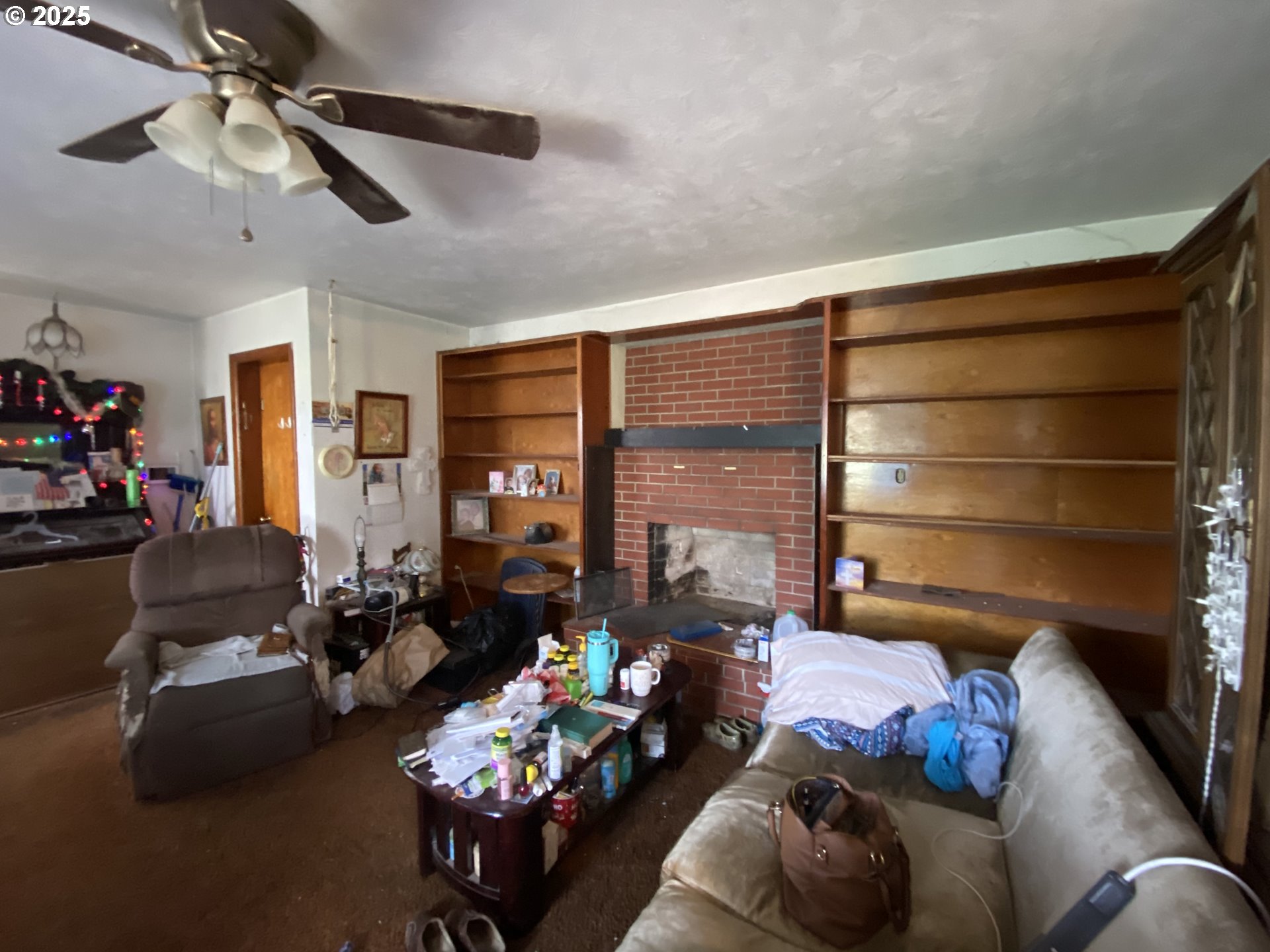 35001 Seavey Loop Road Eugene, OR 97405 - Photo 5 of 16 a living room with furniture gym equipment and a large window
