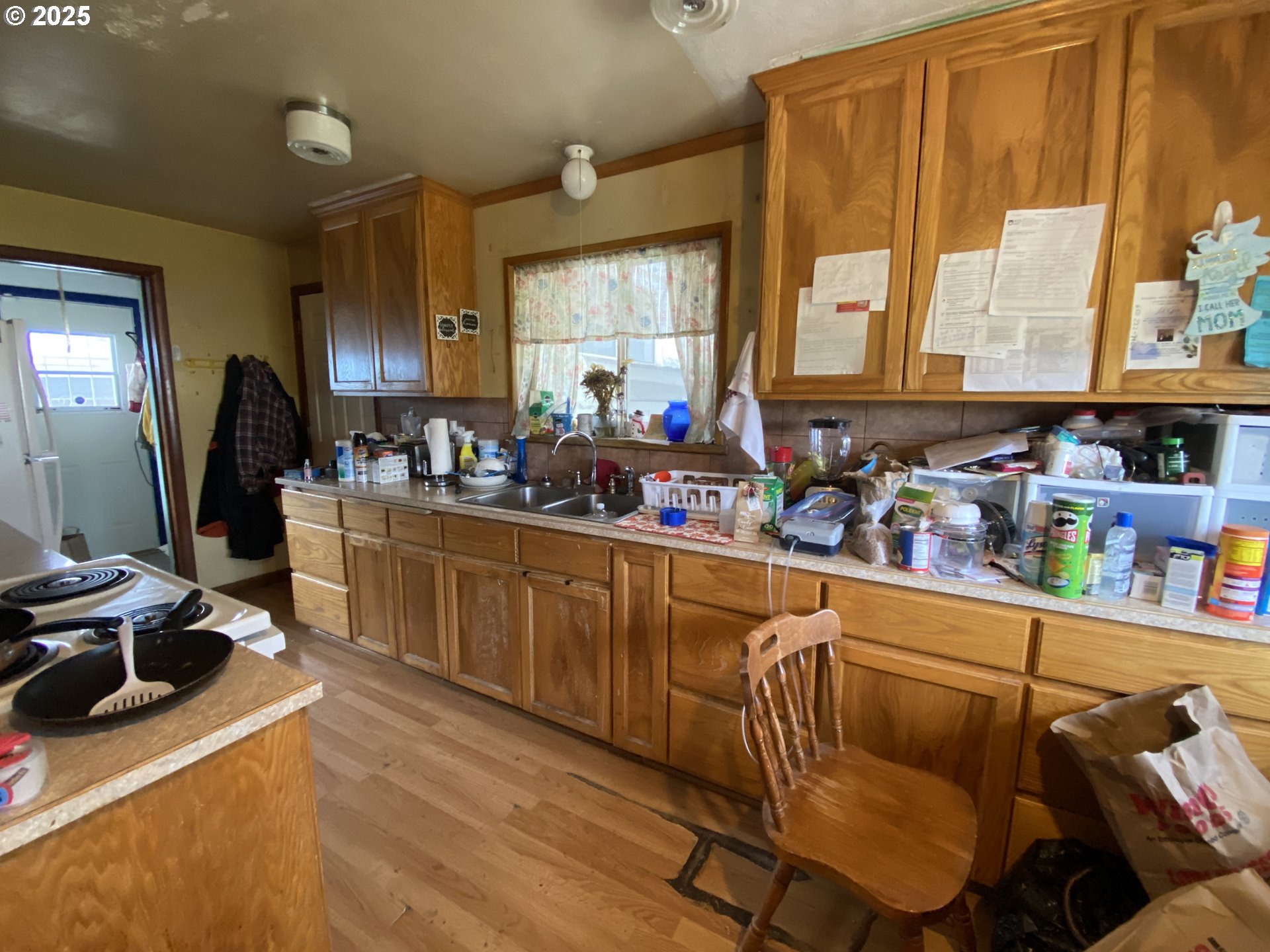 35001 Seavey Loop Road Eugene, OR 97405 - Photo 8 of 16 a kitchen with a sink and a refrigerator