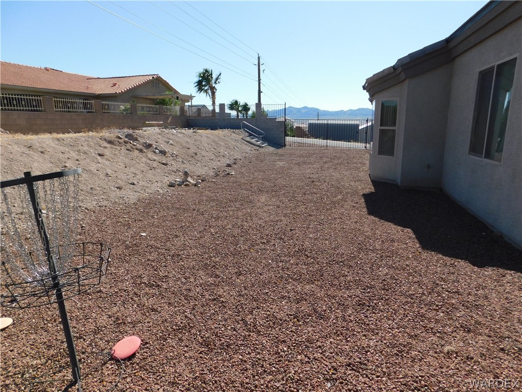 3370 South Ridge Avenue Bullhead City, AZ 86429 - Photo 17 of 56 a view of a backyard of the house