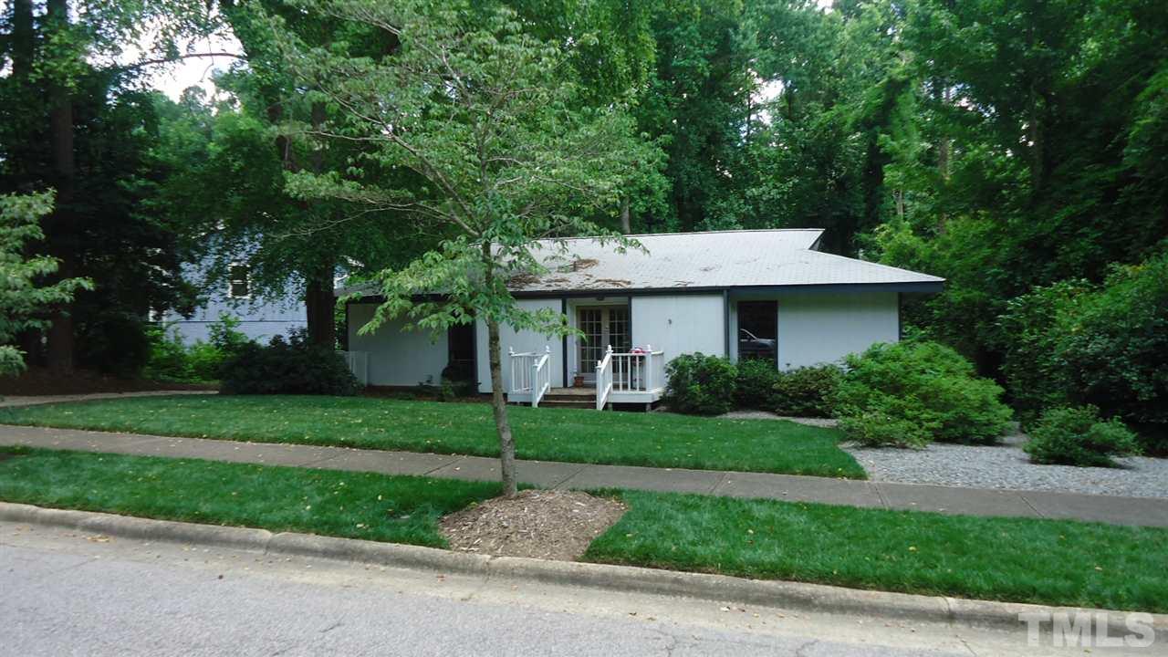 5409 Old Forge Circle Raleigh, NC 27609 - Photo 2 of 19 a front view of a house with a yard and trees