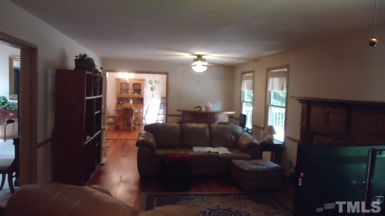 5409 Old Forge Circle Raleigh, NC 27609 - Photo 10 of 19 a living room with furniture and a window