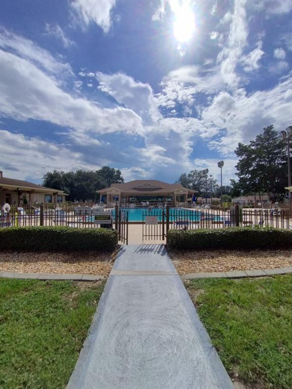 9833 Southwest 61st Court Ocala, FL 34476 - Photo 11 of 14 a view of a lake and a city