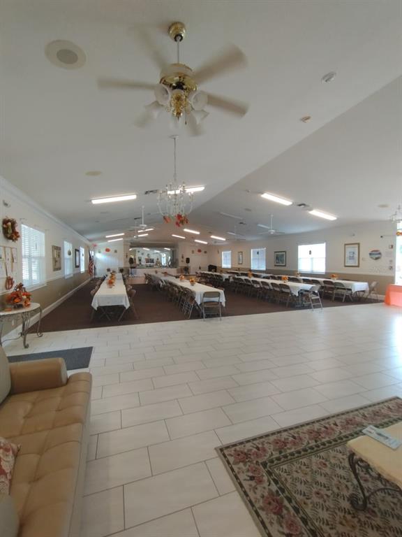 9833 Southwest 61st Court Ocala, FL 34476 - Photo 14 of 14 a large room with kitchen view