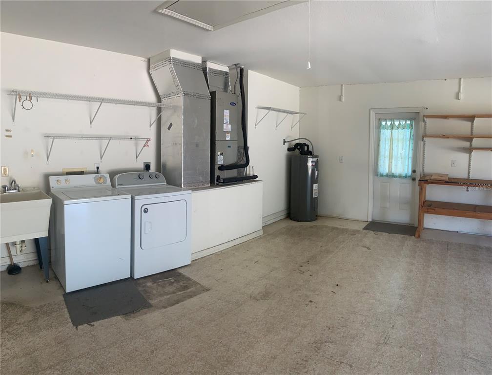 9833 Southwest 61st Court Ocala, FL 34476 - Photo 10 of 14 a view of a storage & utility room