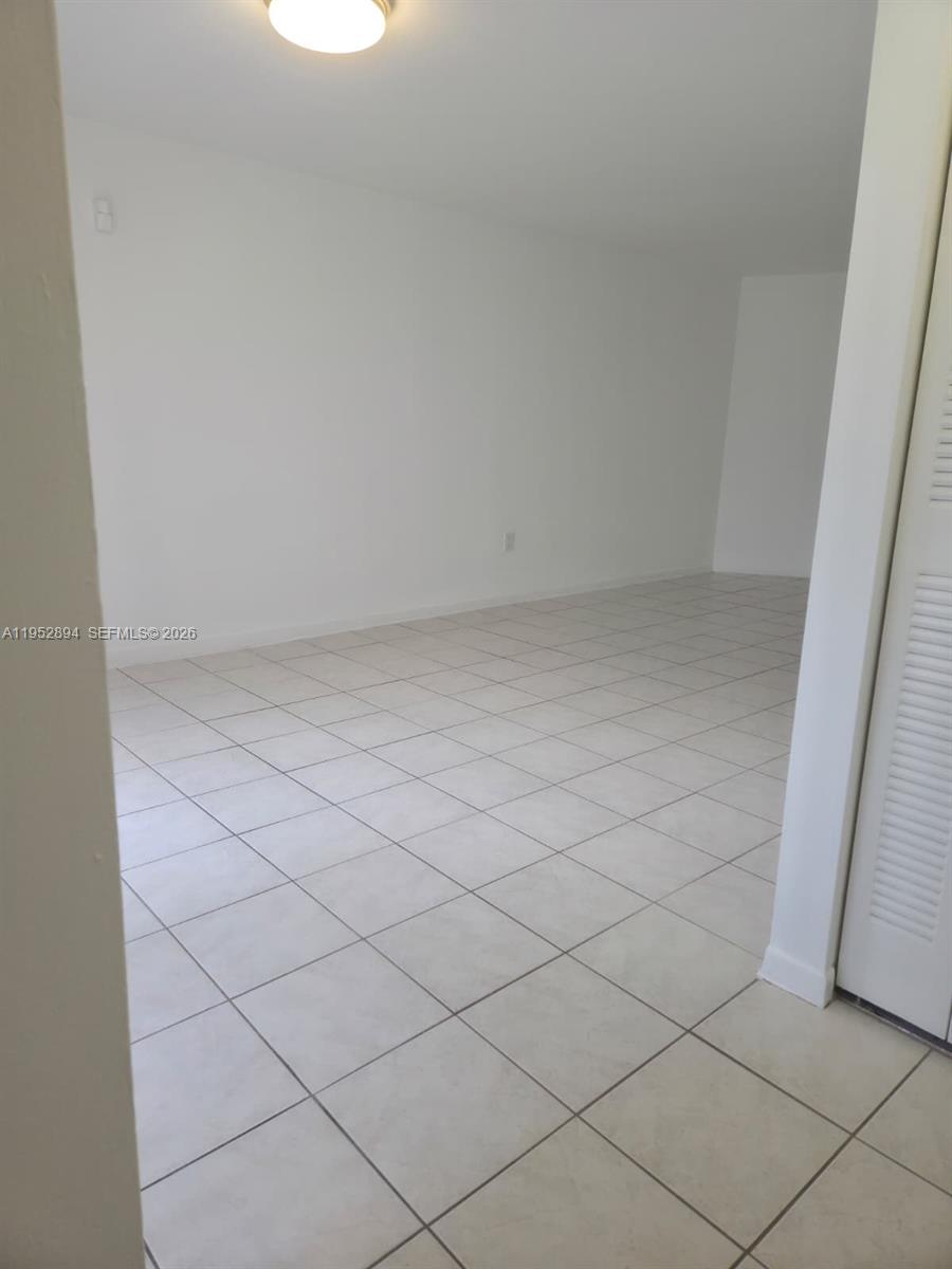 7075 Northwest 186th Street, Unit C104 Hialeah, FL 33015 - Photo 12 of 24 a view of room