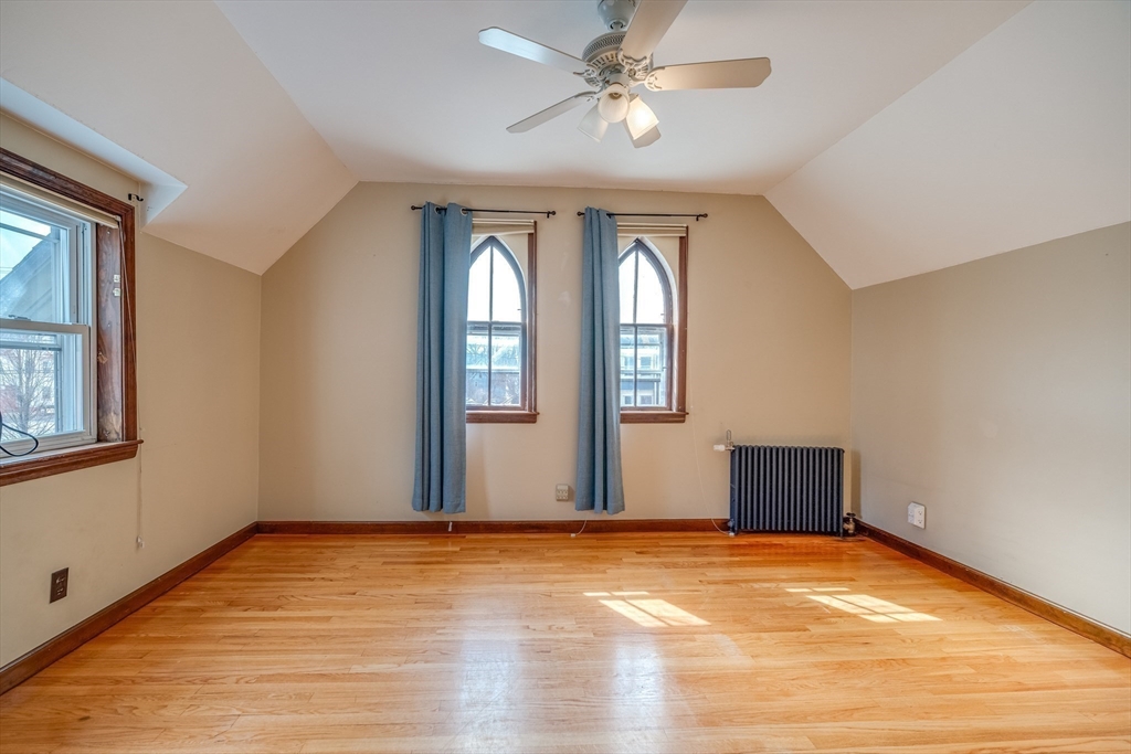 13 Finn Street Northampton, MA 01060 - Photo 29 of 40 a view of a livingroom with wooden floor and a window