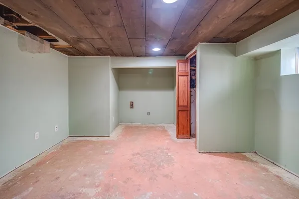 a view of balcony with wooden floor and fence