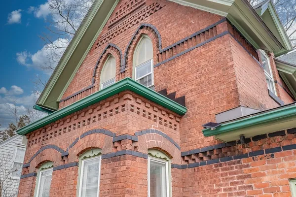 a building with a clock on the wall