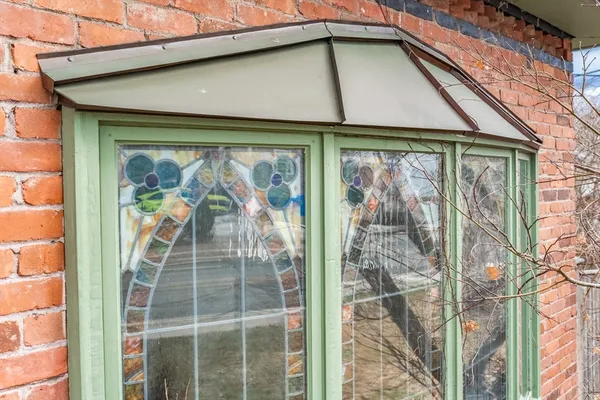 a view of a bird house on the balcony