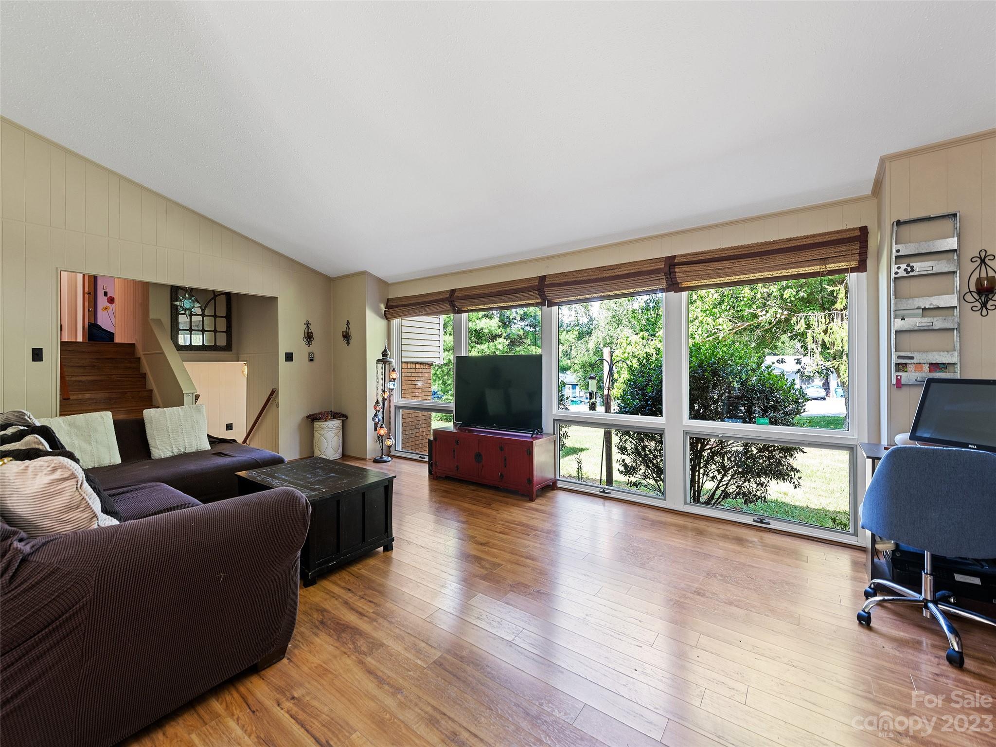 69 Patton Cemetery Road Swannanoa, NC 28778 - Photo 11 of 35 a living room with furniture and a large window