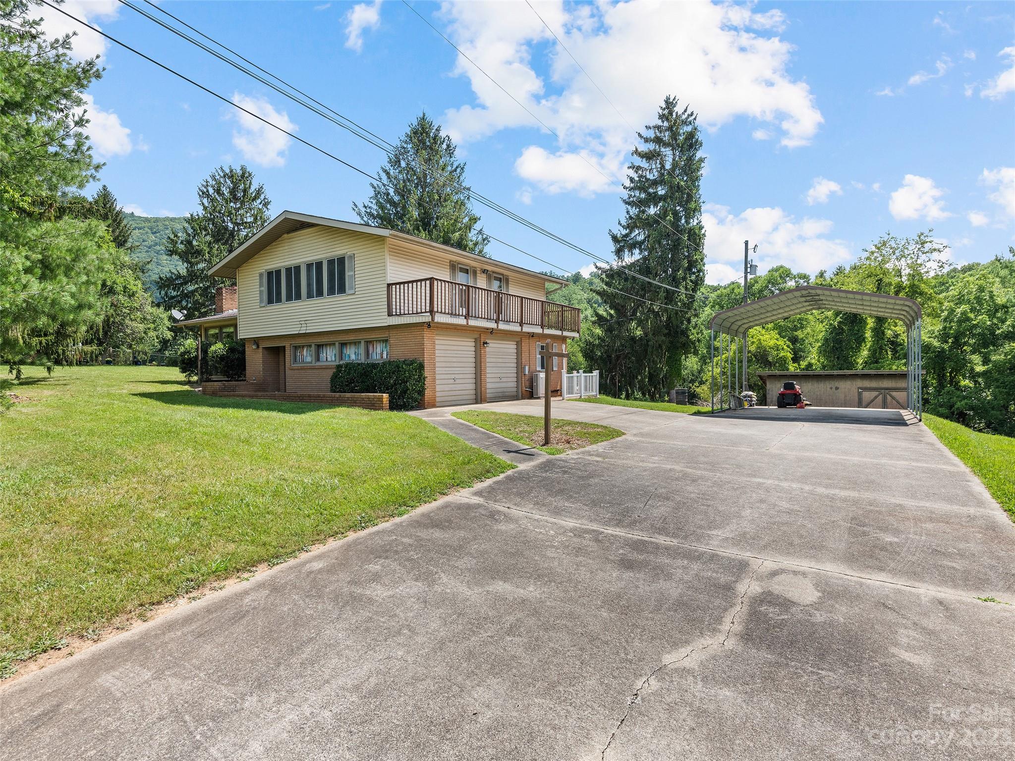 69 Patton Cemetery Road Swannanoa, NC 28778 - Photo 2 of 35 a view of a house with a yard
