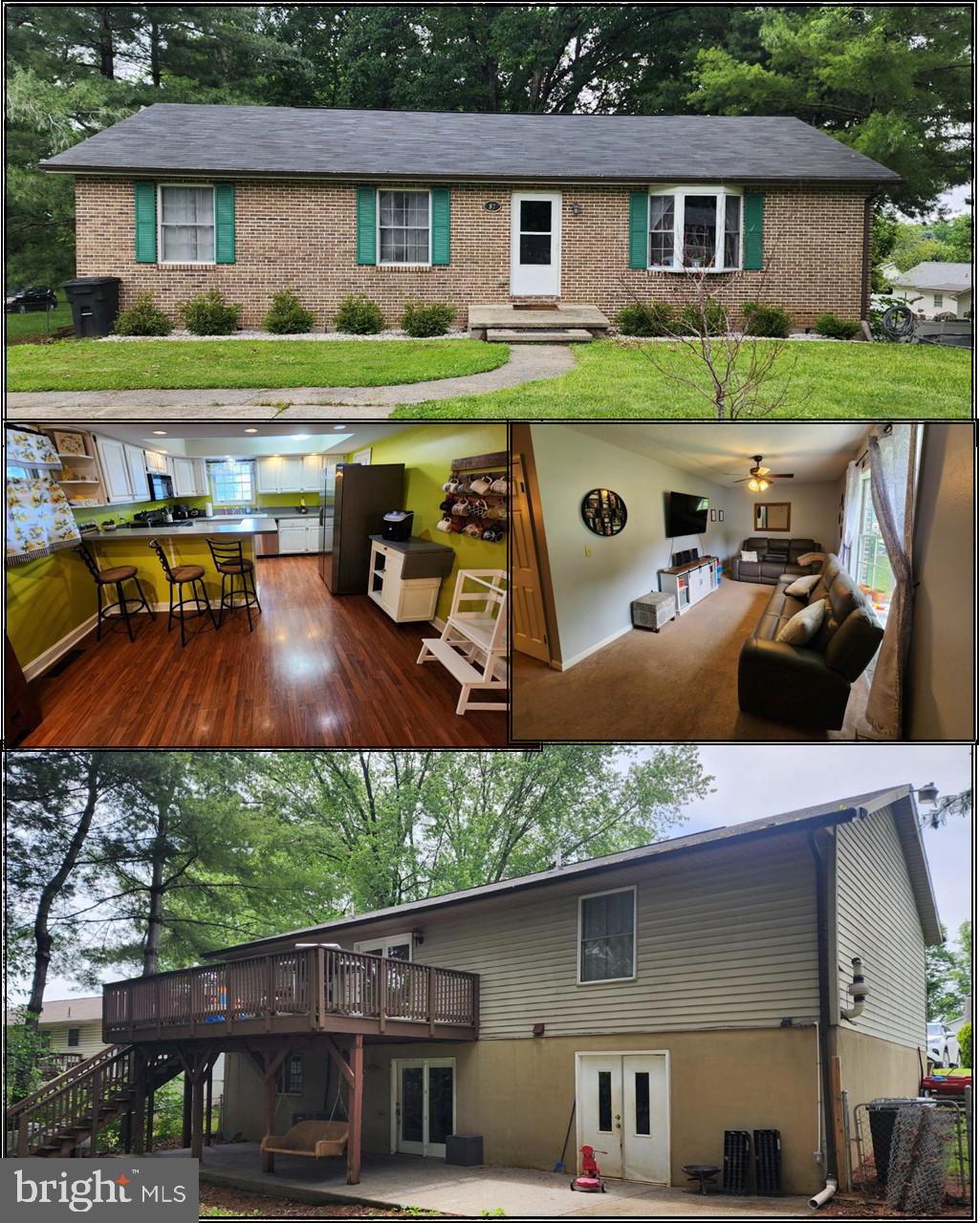 87 Summers Street Inwood, WV 25428 - Photo 1 of 41 a front view of a house with garden