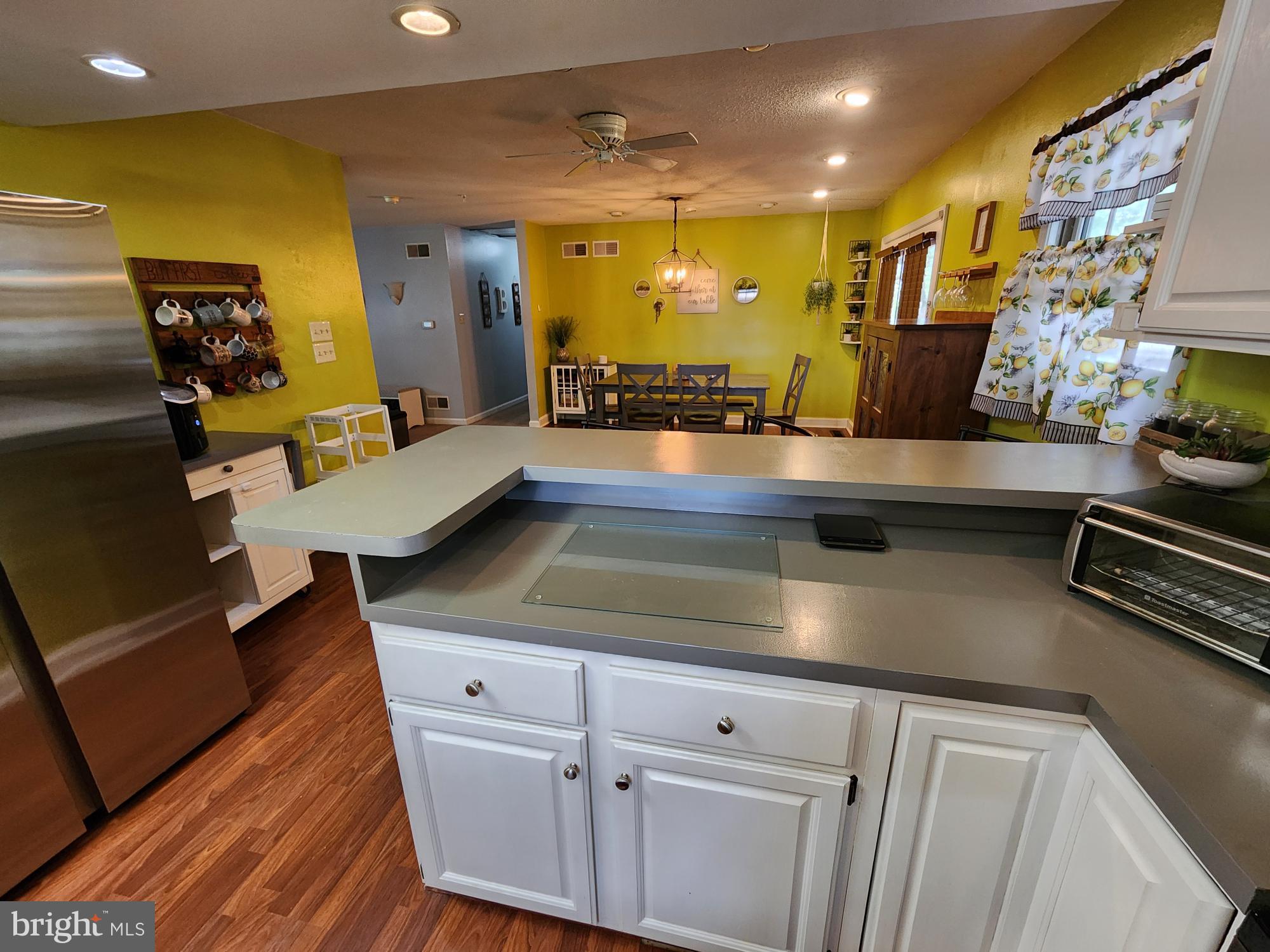 87 Summers Street Inwood, WV 25428 - Photo 12 of 41 a view of a living room with furniture and wooden floor