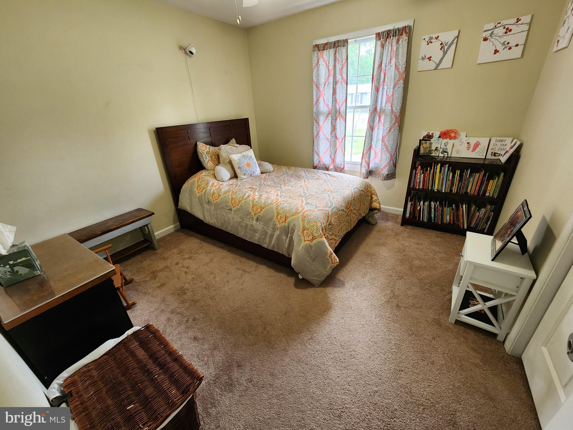 87 Summers Street Inwood, WV 25428 - Photo 16 of 41 a bedroom with a bed and window