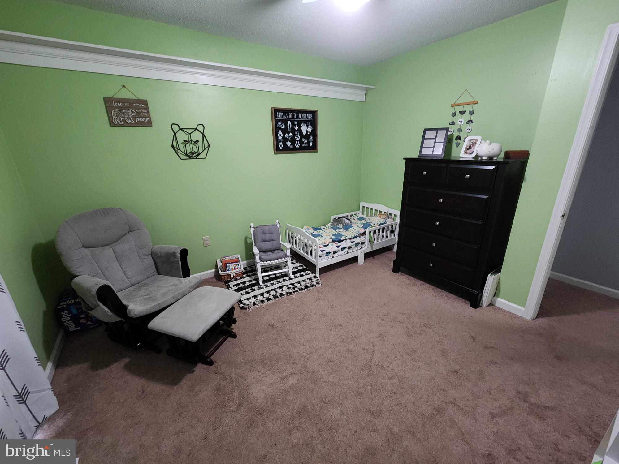 87 Summers Street Inwood, WV 25428 - Photo 19 of 41 a bedroom with a bed and furniture