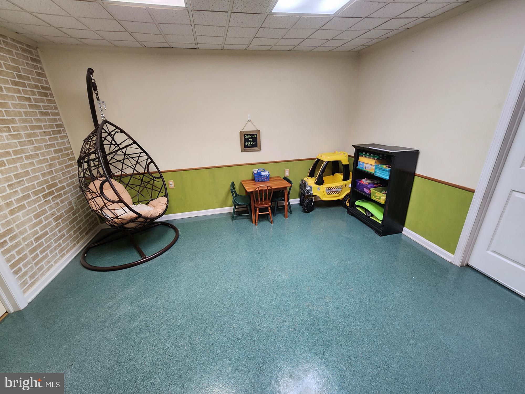 87 Summers Street Inwood, WV 25428 - Photo 24 of 41 a living room with furniture and a wooden floor