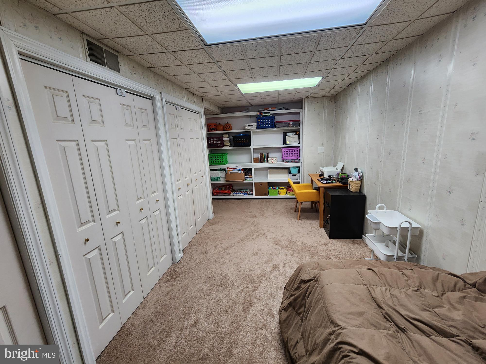 87 Summers Street Inwood, WV 25428 - Photo 27 of 41 a bed room with a bed and furniture