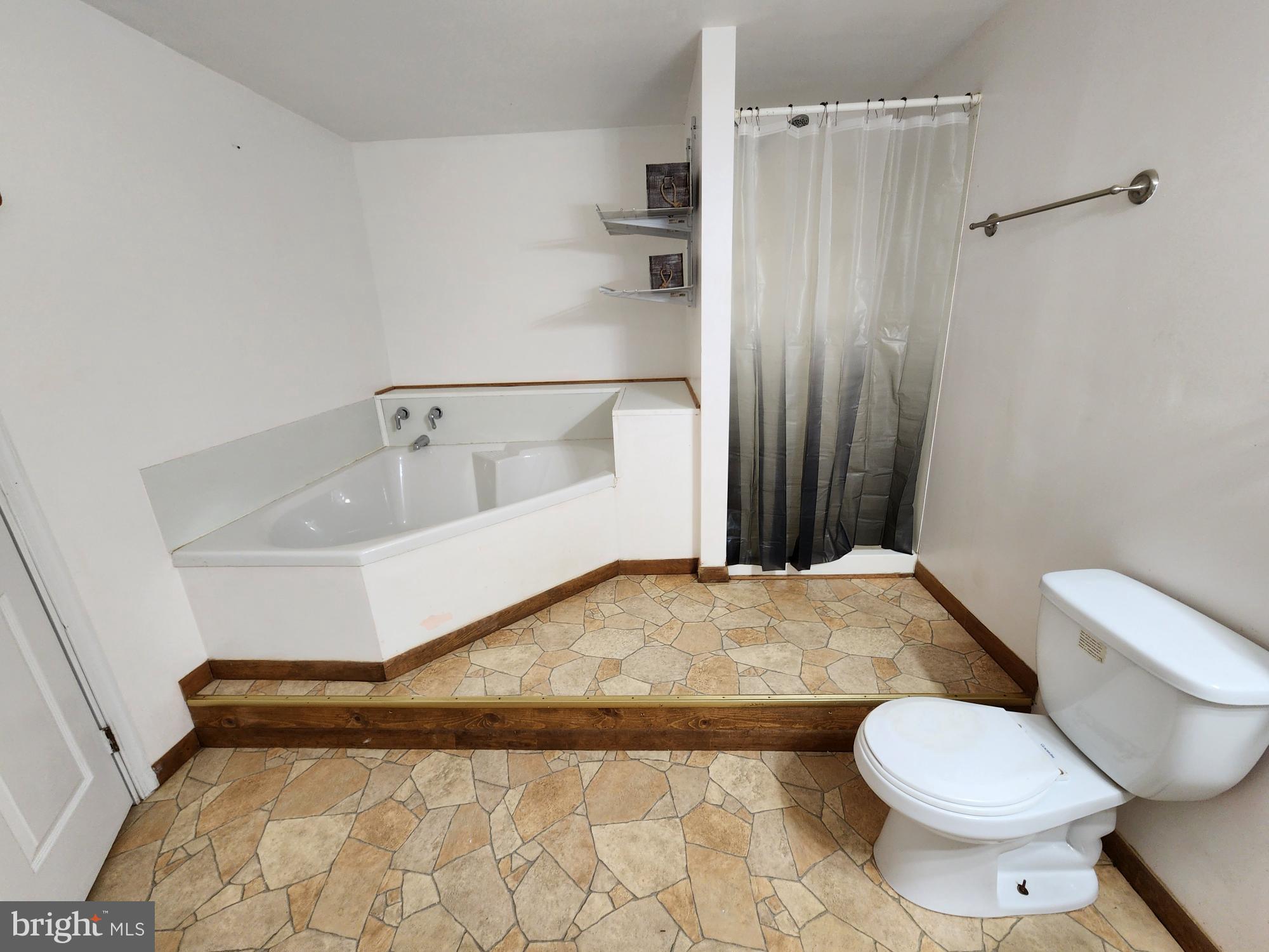 87 Summers Street Inwood, WV 25428 - Photo 29 of 41 a bathroom with a sink and toilet