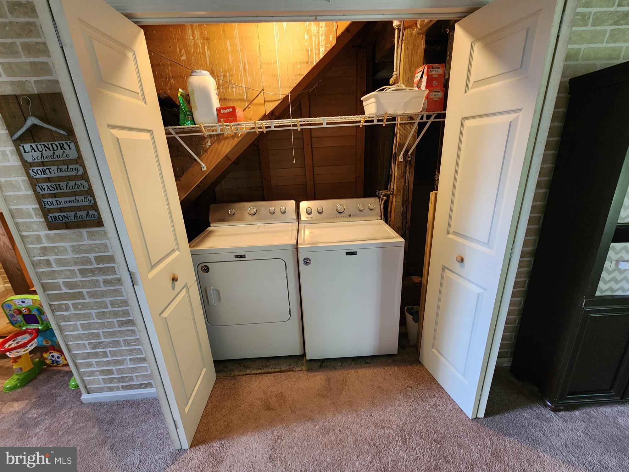87 Summers Street Inwood, WV 25428 - Photo 32 of 41 a utility room with dryer and washer